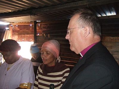 Blessing this little home which was built with funds from the people in Lancashire.