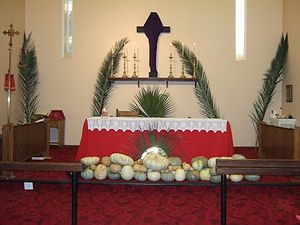 The pumpkins lay on the steps to the altar